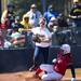 Michigan senior Amy Knapp goes to the ground after making an out at third in the game against Louisiana-Lafayette on Friday, May 24. Daniel Brenner I AnnArbor.com